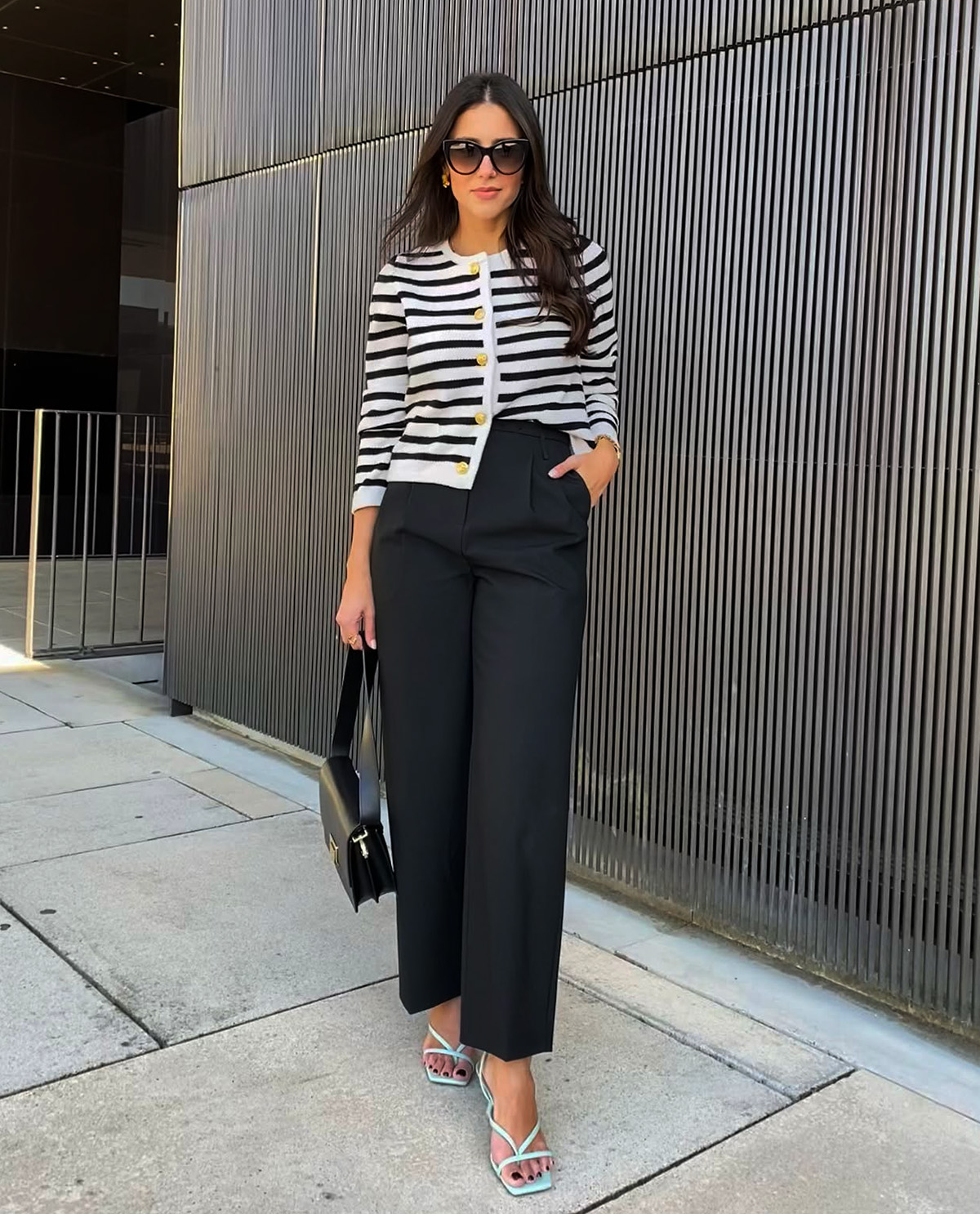 striped cardigan with black wide-leg trousers for a polished office look