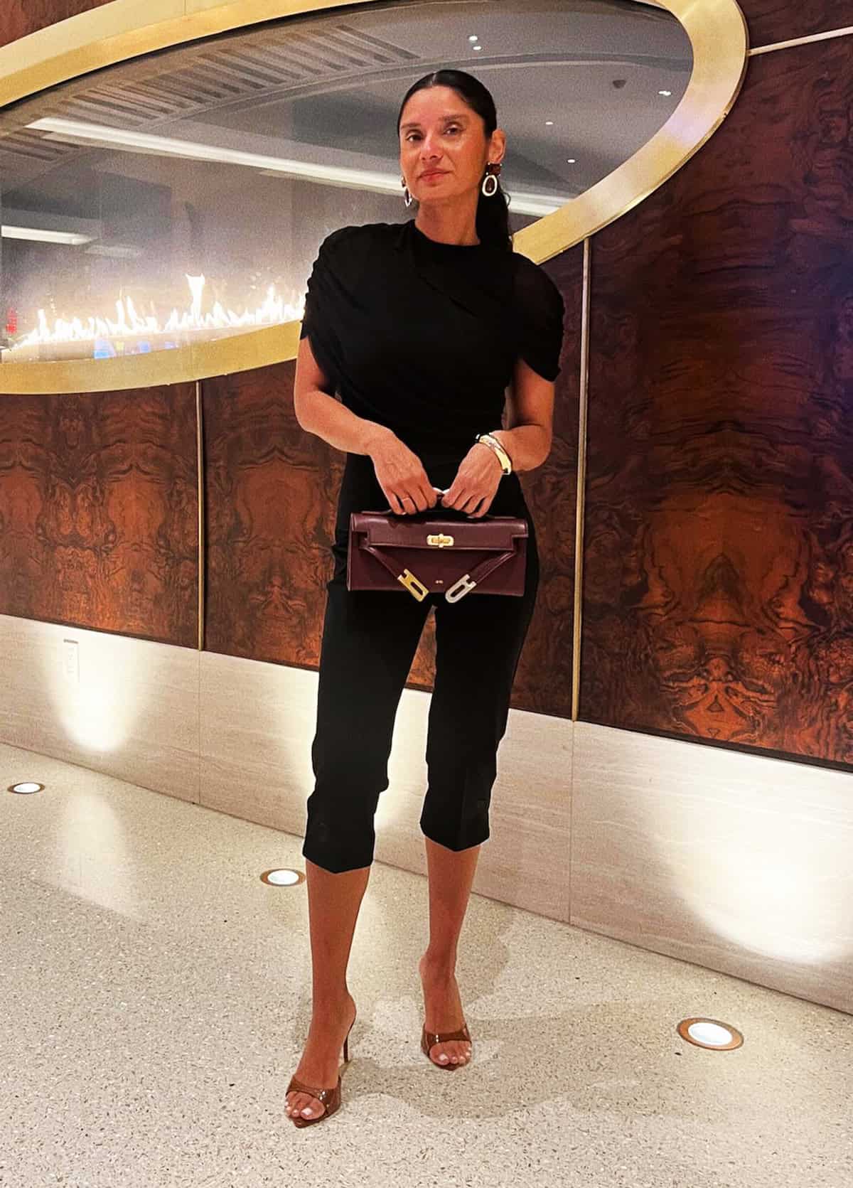 black fitted top with cropped tailored trousers and neutral heels classy outfits for date night