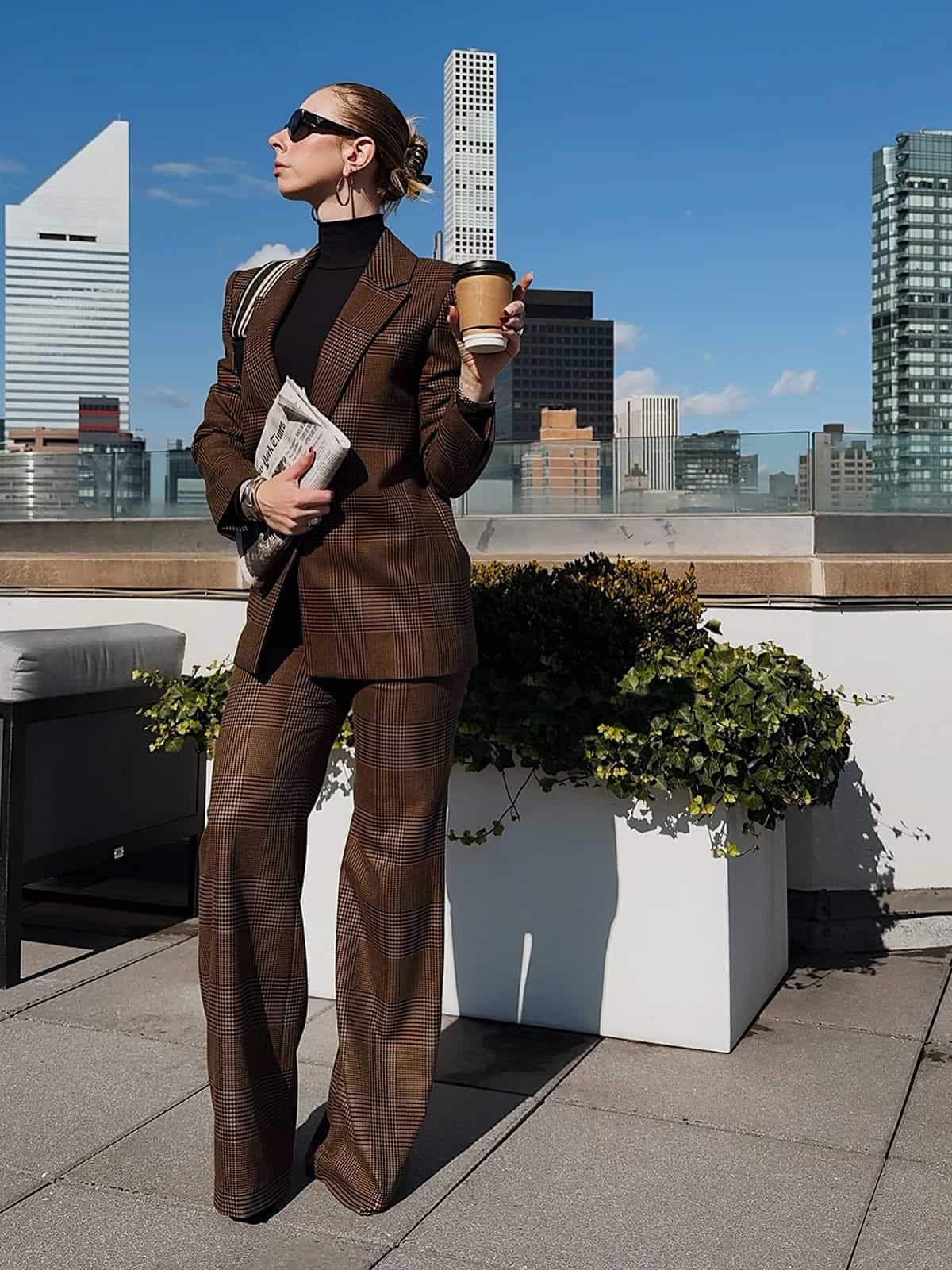 tailored brown plaid power suit styled for a polished office look