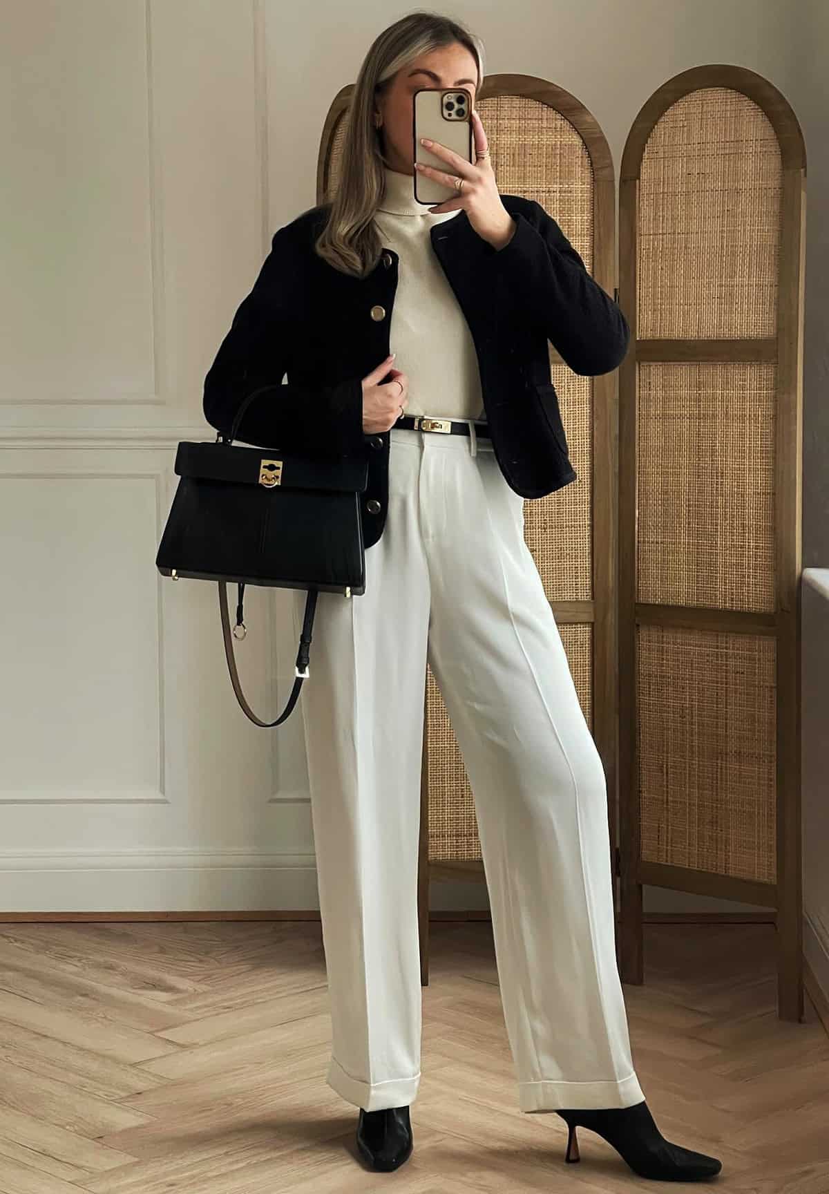 black jacket with white wide-leg trousers for a classy office outfit