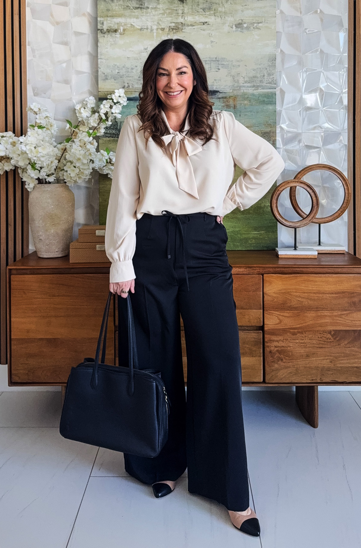neutral blouse with wide-leg trousers for a classy office look
