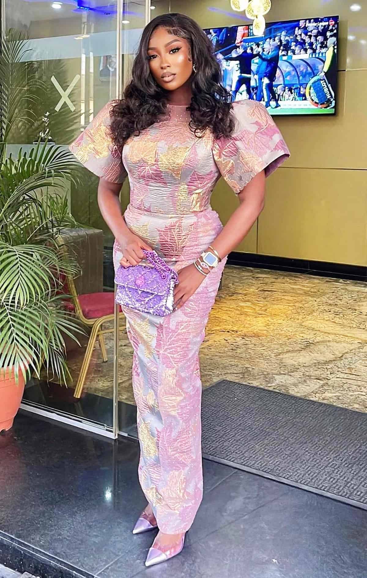 classy pastel brocade gown with statement sleeves for wedding guest