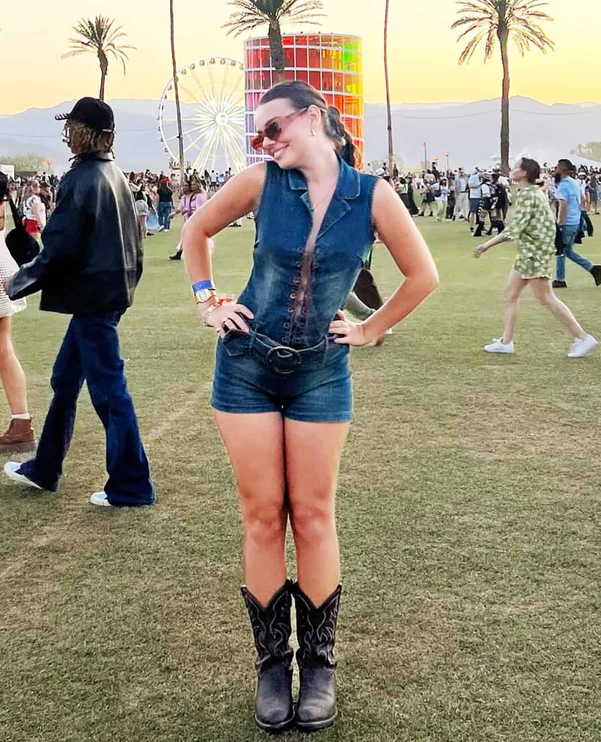 denim romper with cowboy boots outfit ideas for music festival, festival outfit ideas