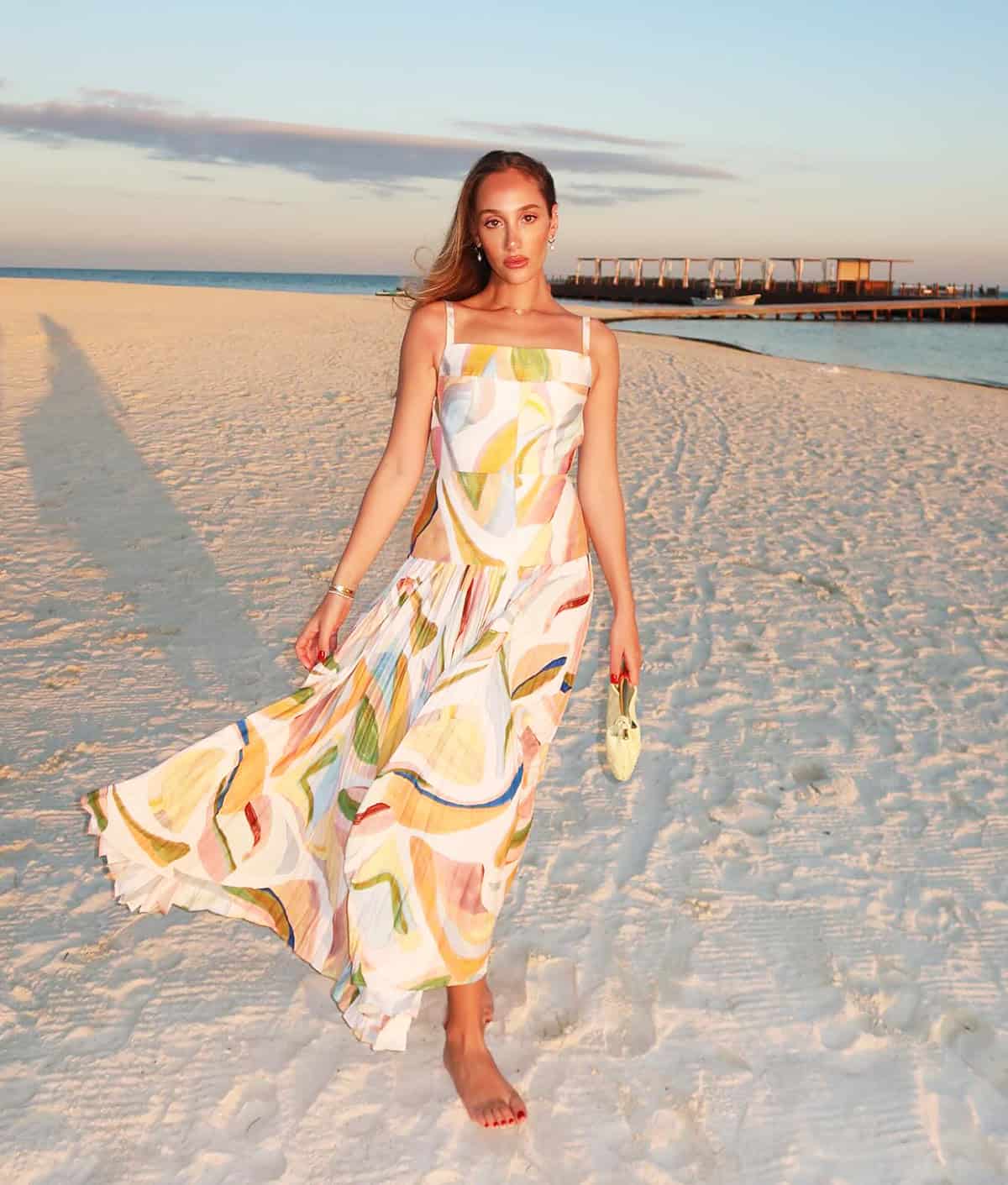 colorful printed maxi dress for a Cancun beach sunset outfit