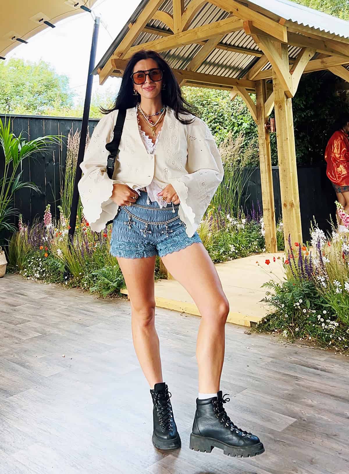 white blouse with denim shorts and combat boots outfit ideas for music festival