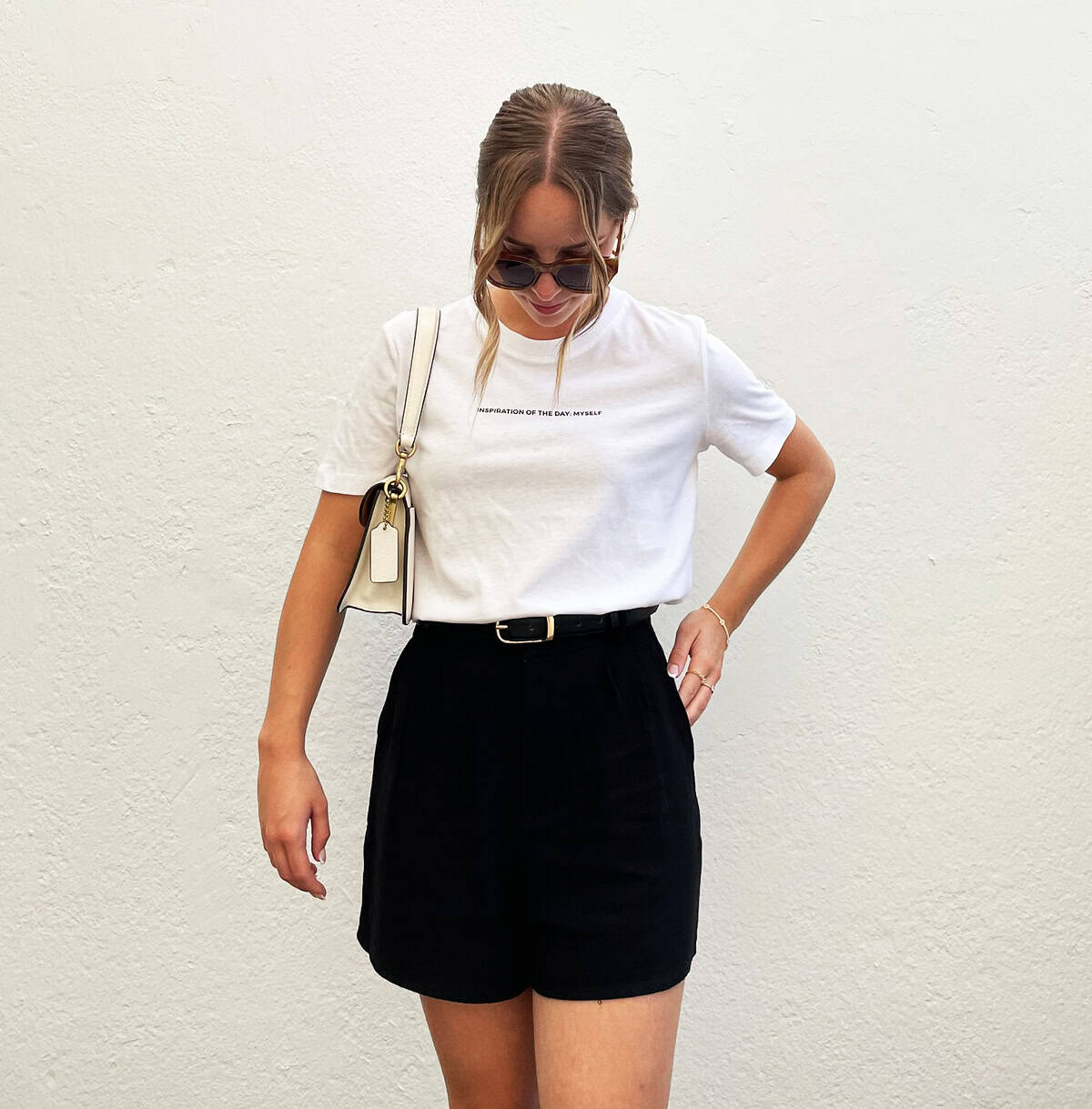 cute outfits summer for women over 30 featuring a white tee paired with black shorts