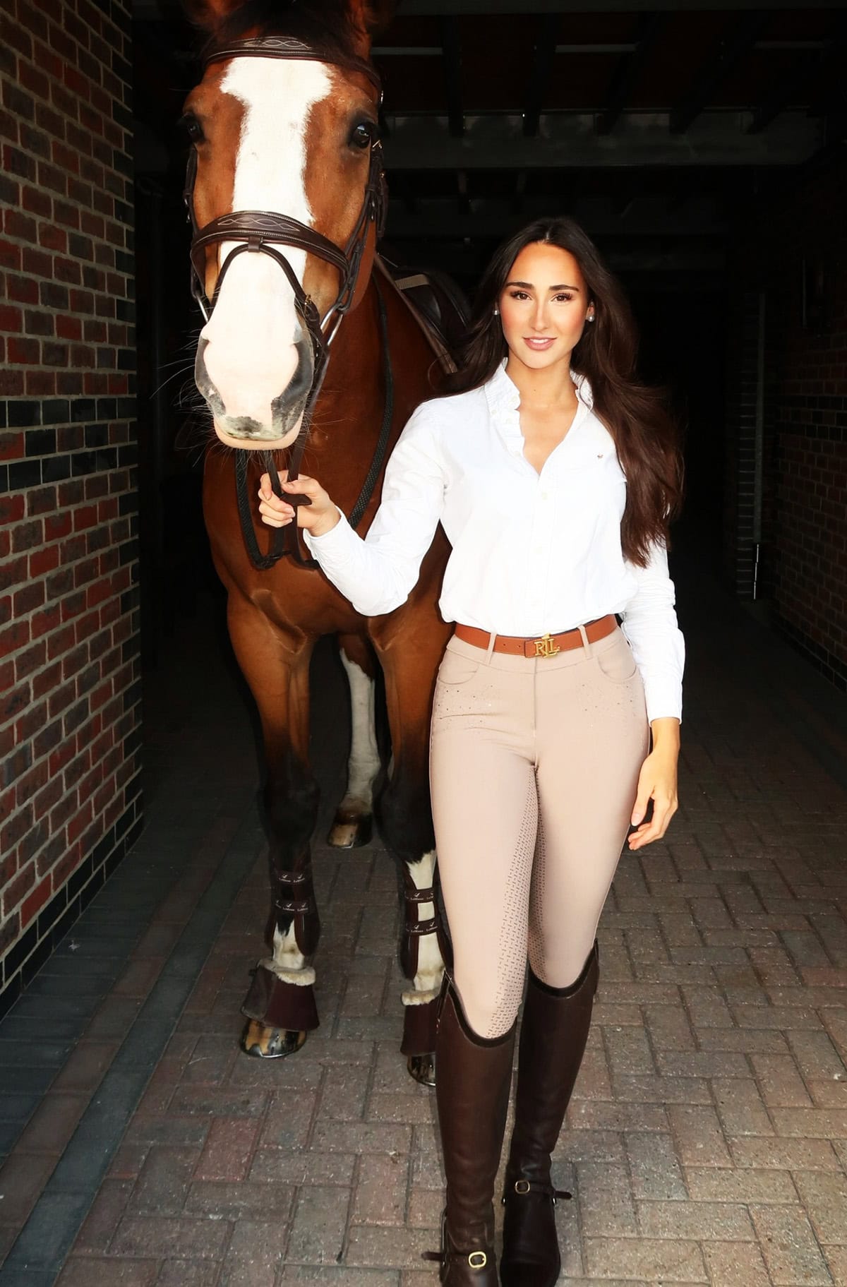 white shirt and breeches equestrian outfit ideas with tall boots classic riding look