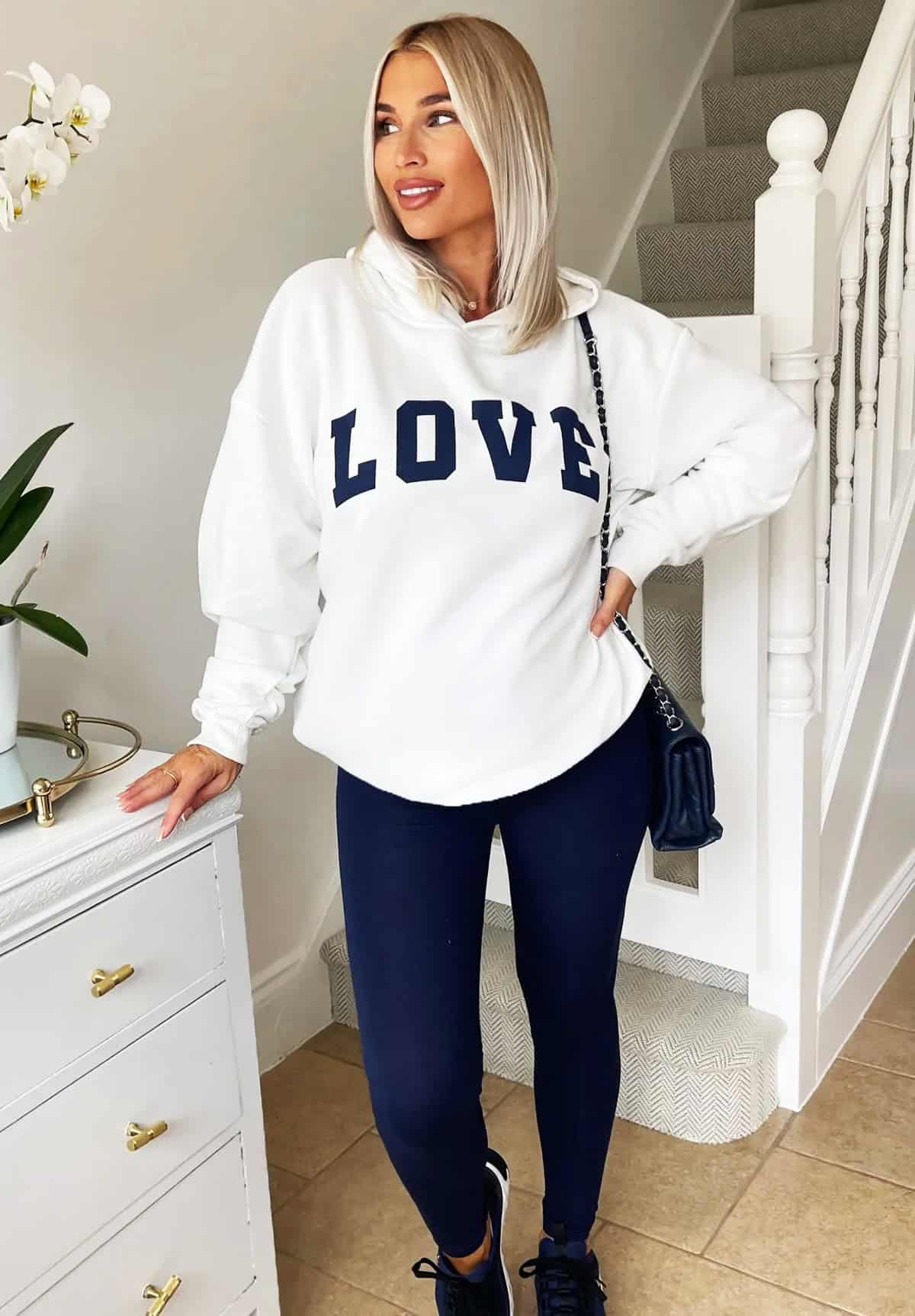 cute casual hoodie outfit with leggings and sneakers for women