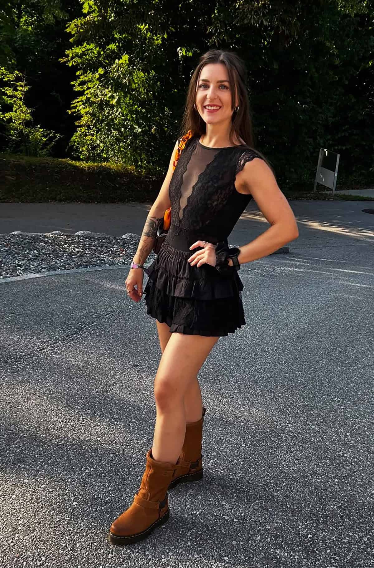 black lace mini dress with ankle boots outfit ideas for music festival