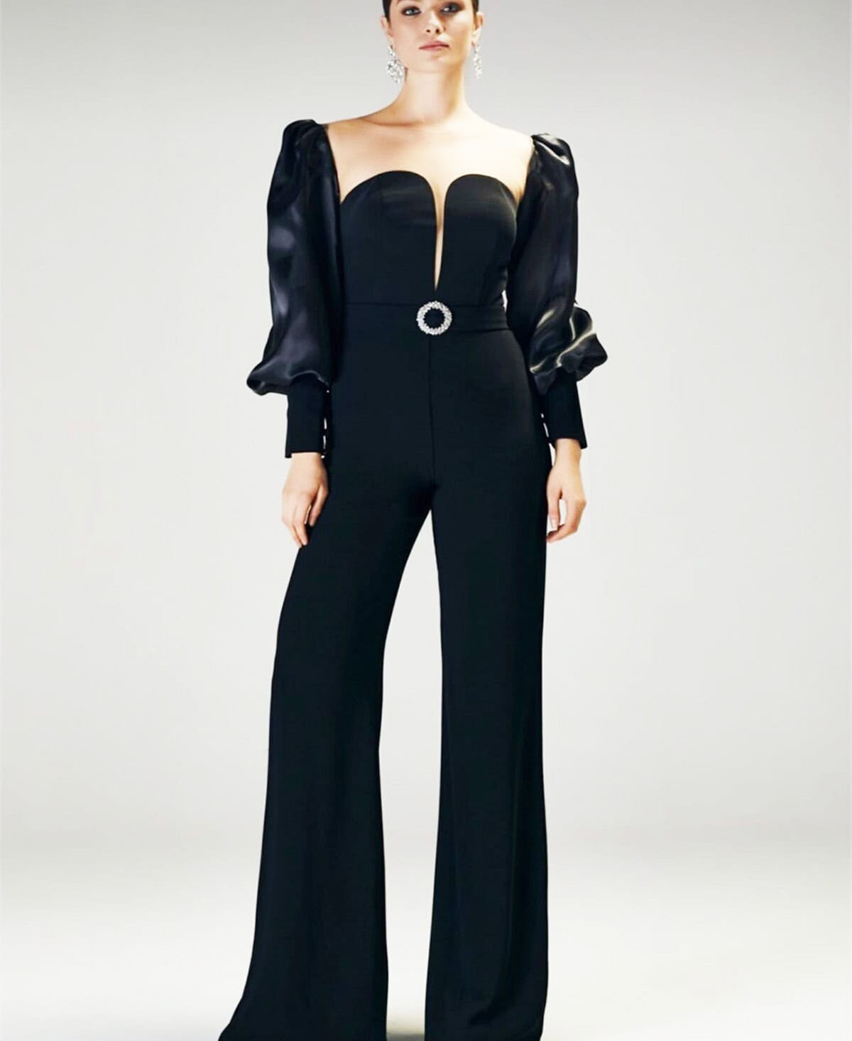 black wide leg jumpsuit styled as cocktail attire for women