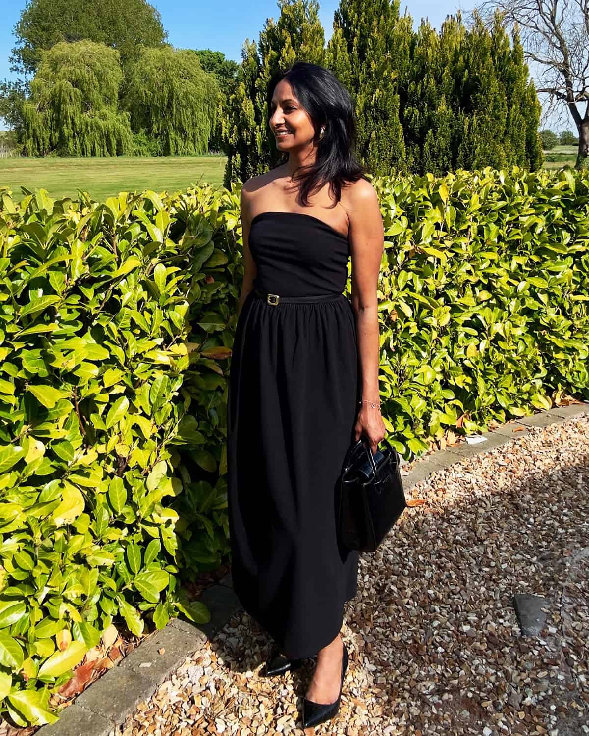 black strapless midi cocktail dress for a cocktail dress code event on a budget