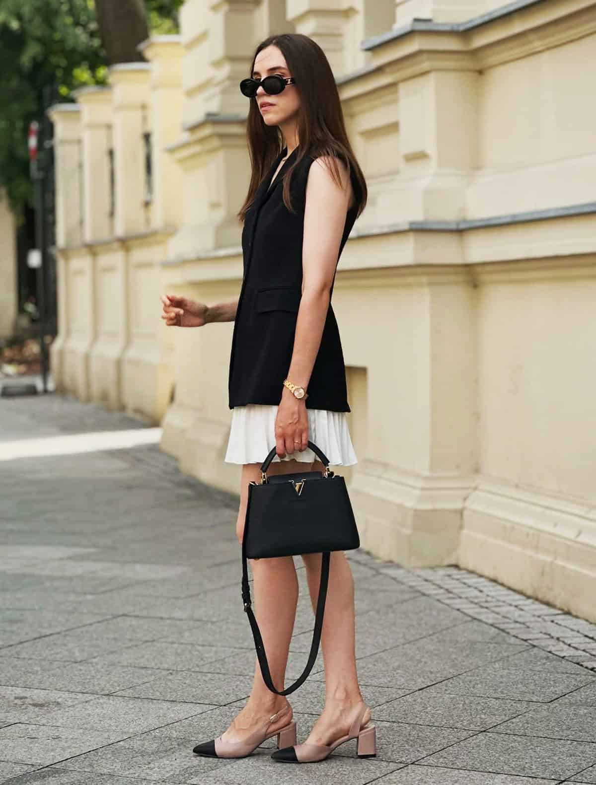 cute outfits summer for women over 30 featuring a longline vest layered over a chic summer outfit