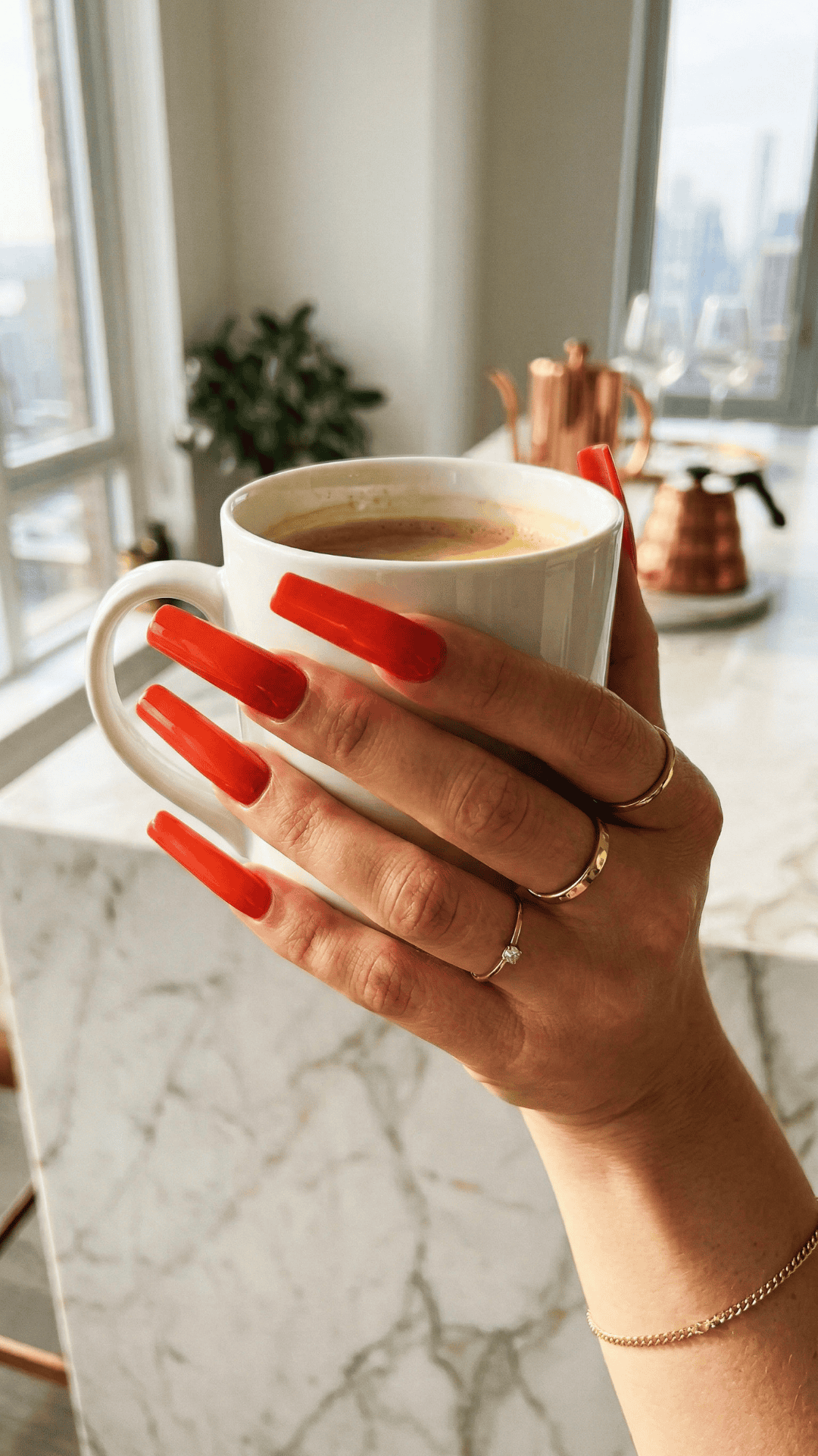 long, clean, coffin shaped red baddie nails