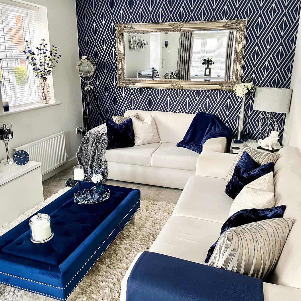 geometric navy wallpaper with white lines behind cream sofa dark blue wallpaper ideas home decor