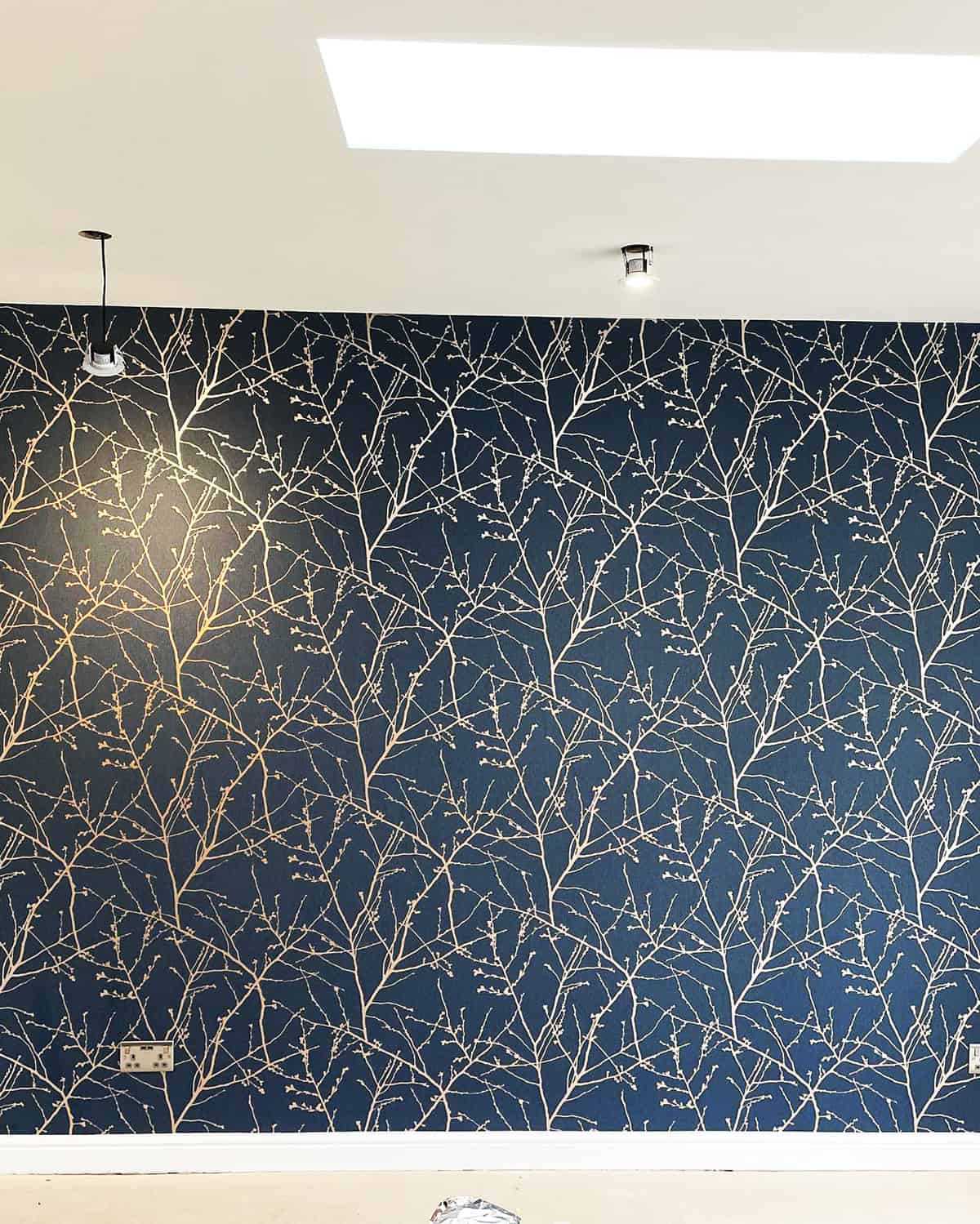 soft branch pattern wallpaper in muted dark blue bedroom wall dark blue wallpaper ideas home decor