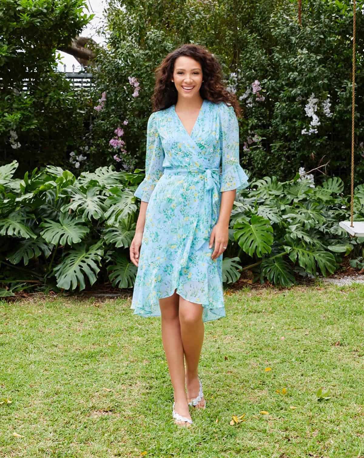 blue floral wrap dress with flattering silhouette in garden setting cottagecore summer dresses