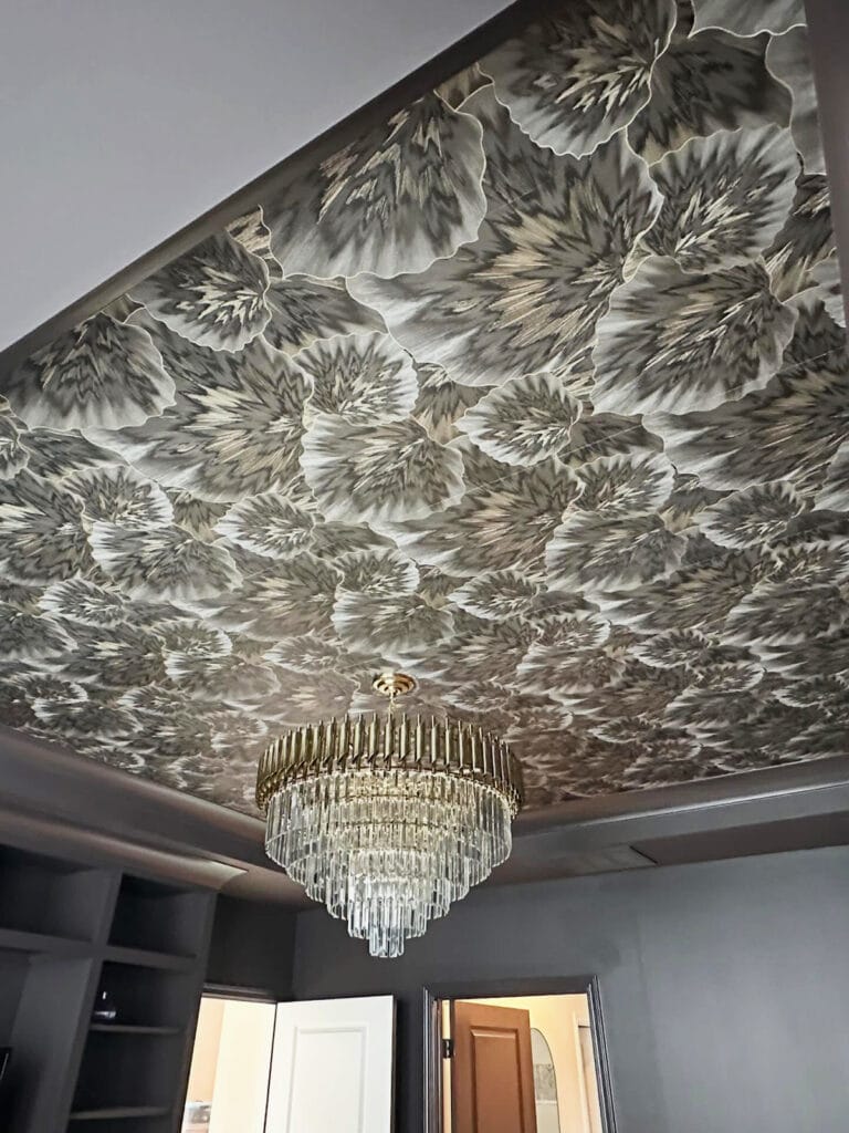 room with black floral wallpaper ceiling and statement chandelier black wallpaper ideas home decor