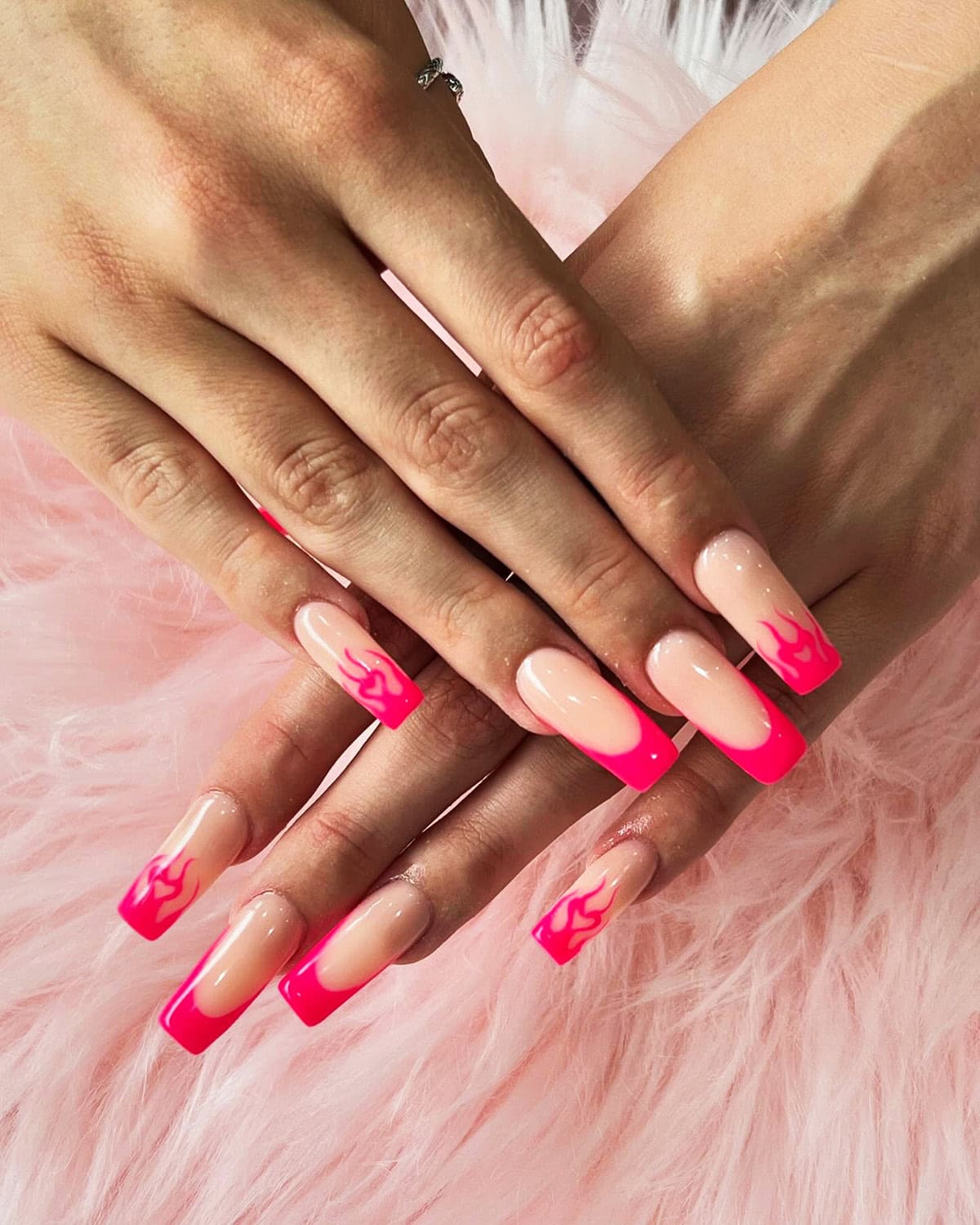 long coffin nails with hot pink French tips and small pink flame details fire nails