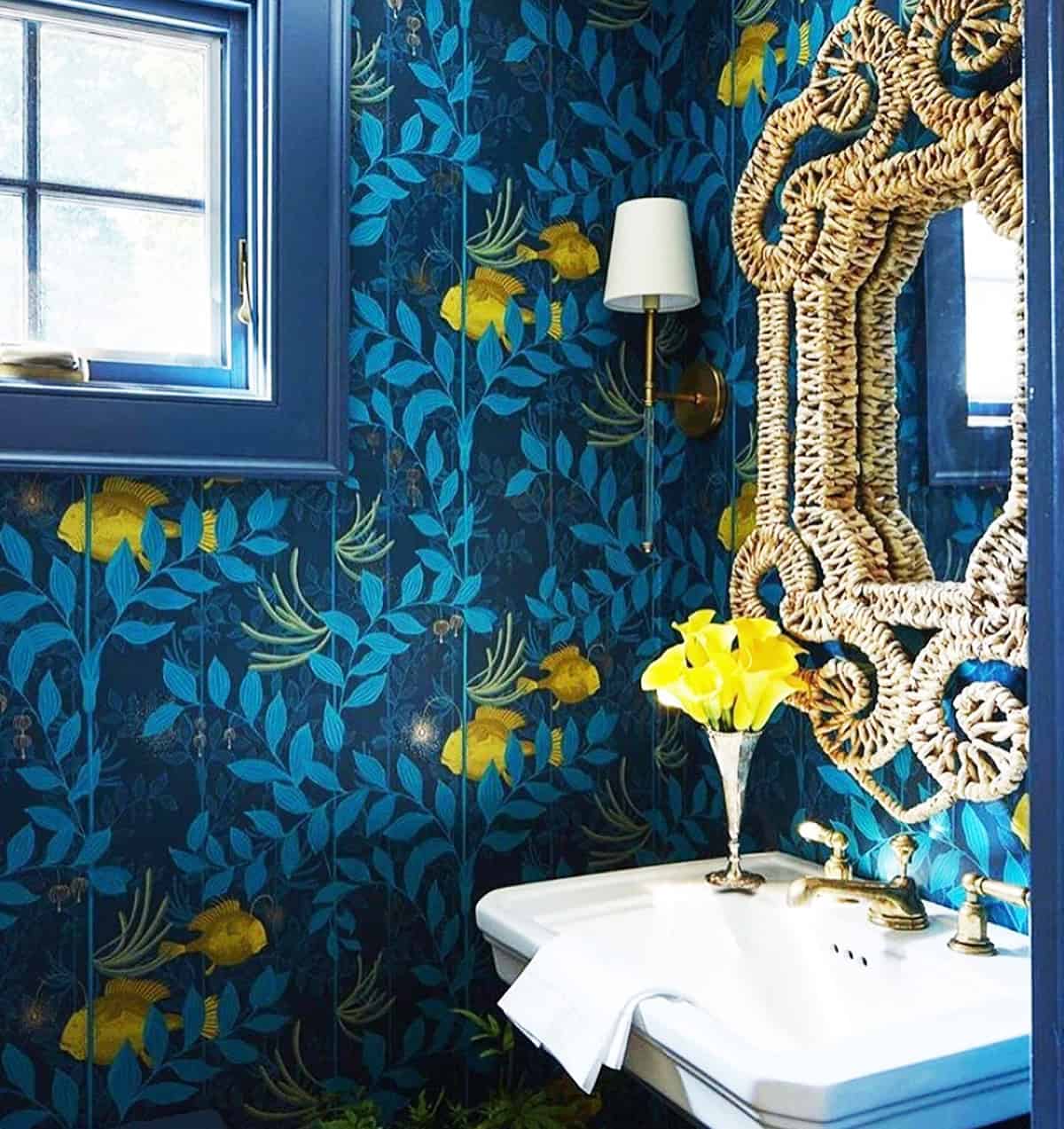 bold botanical wallpaper with yellow fish and leaves in dark blue bathroom dark blue wallpaper ideas home decor