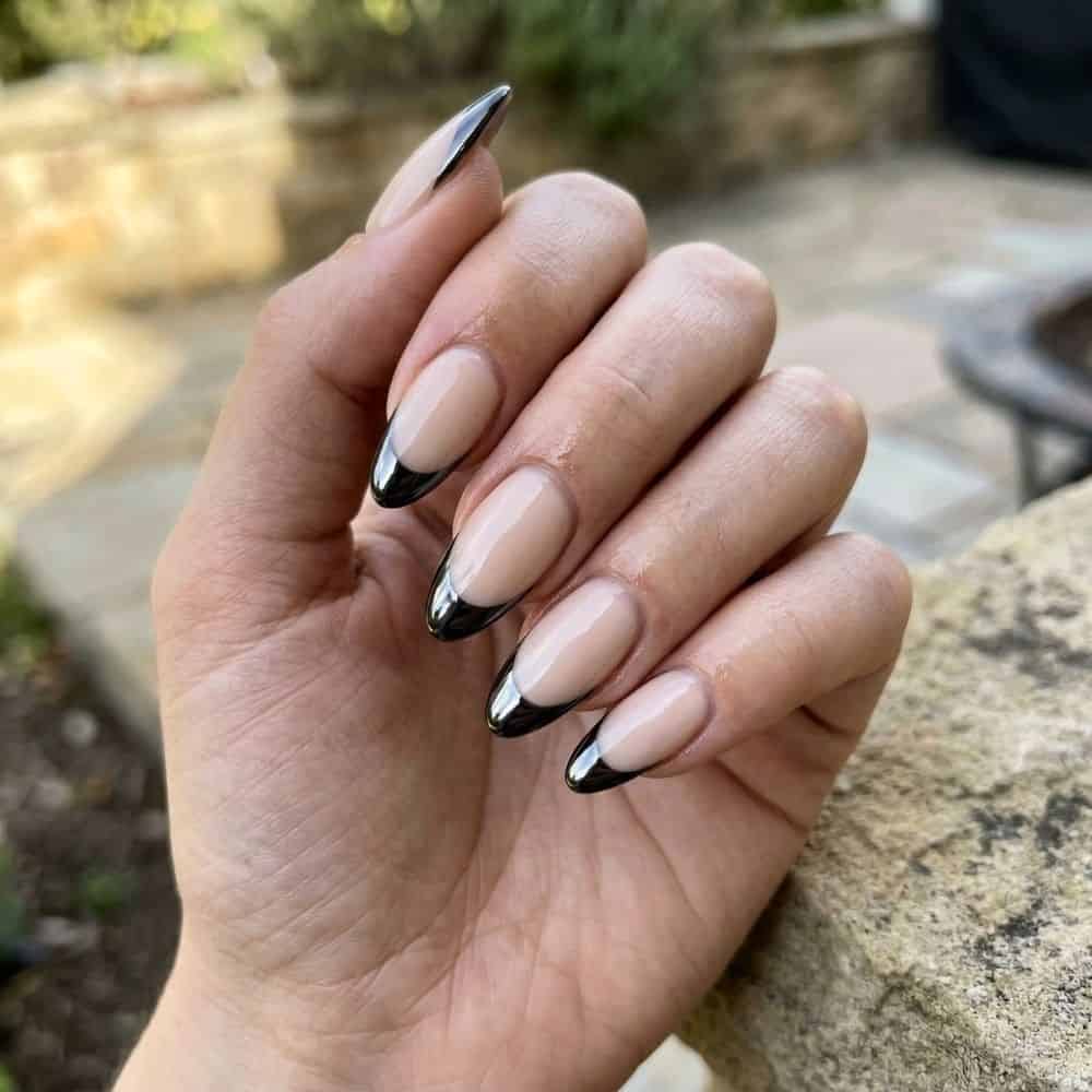 black chrome nails tips with nude base