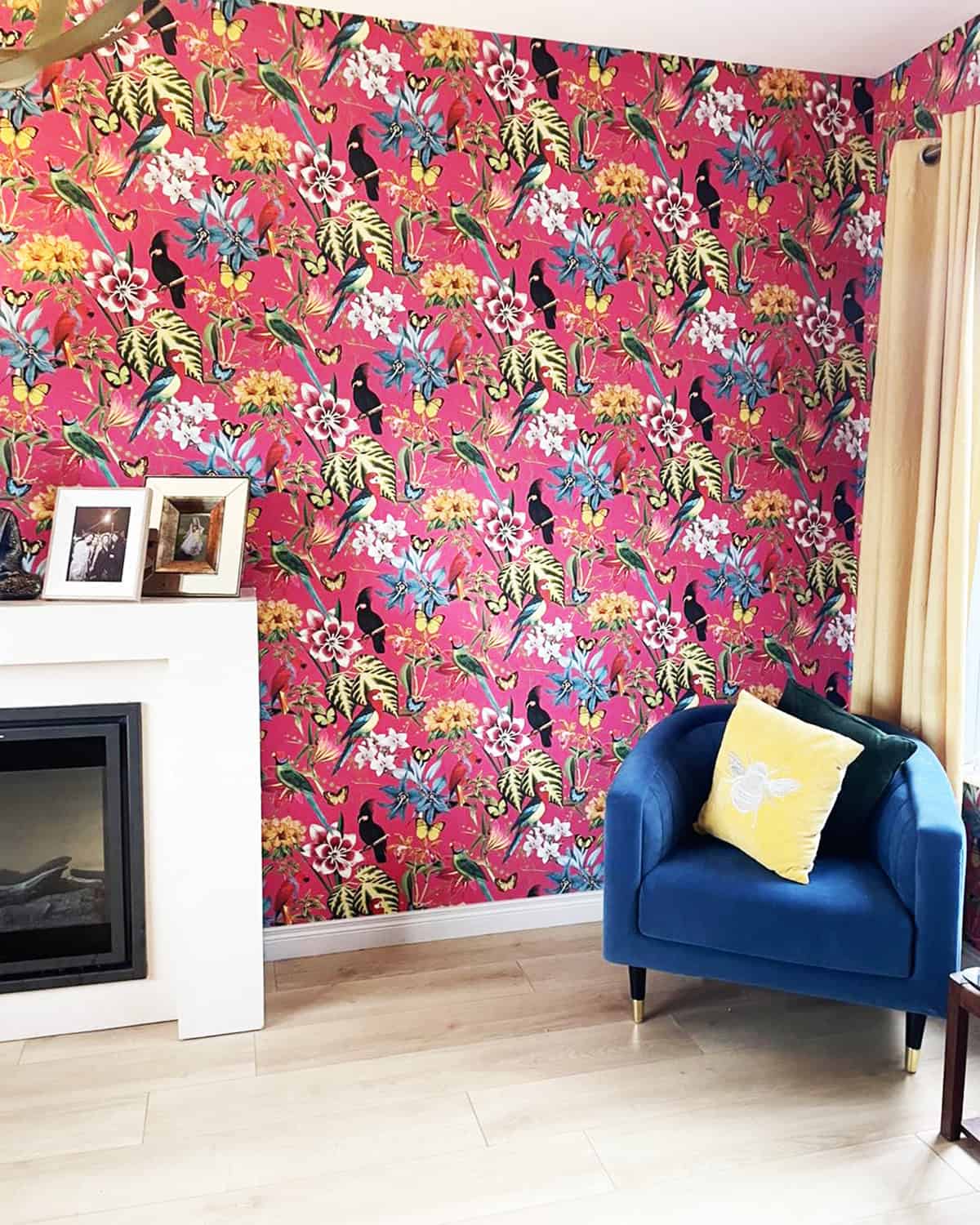 hot pink tropical bird and floral wallpaper in a living roompink wallpaper ideas home decor