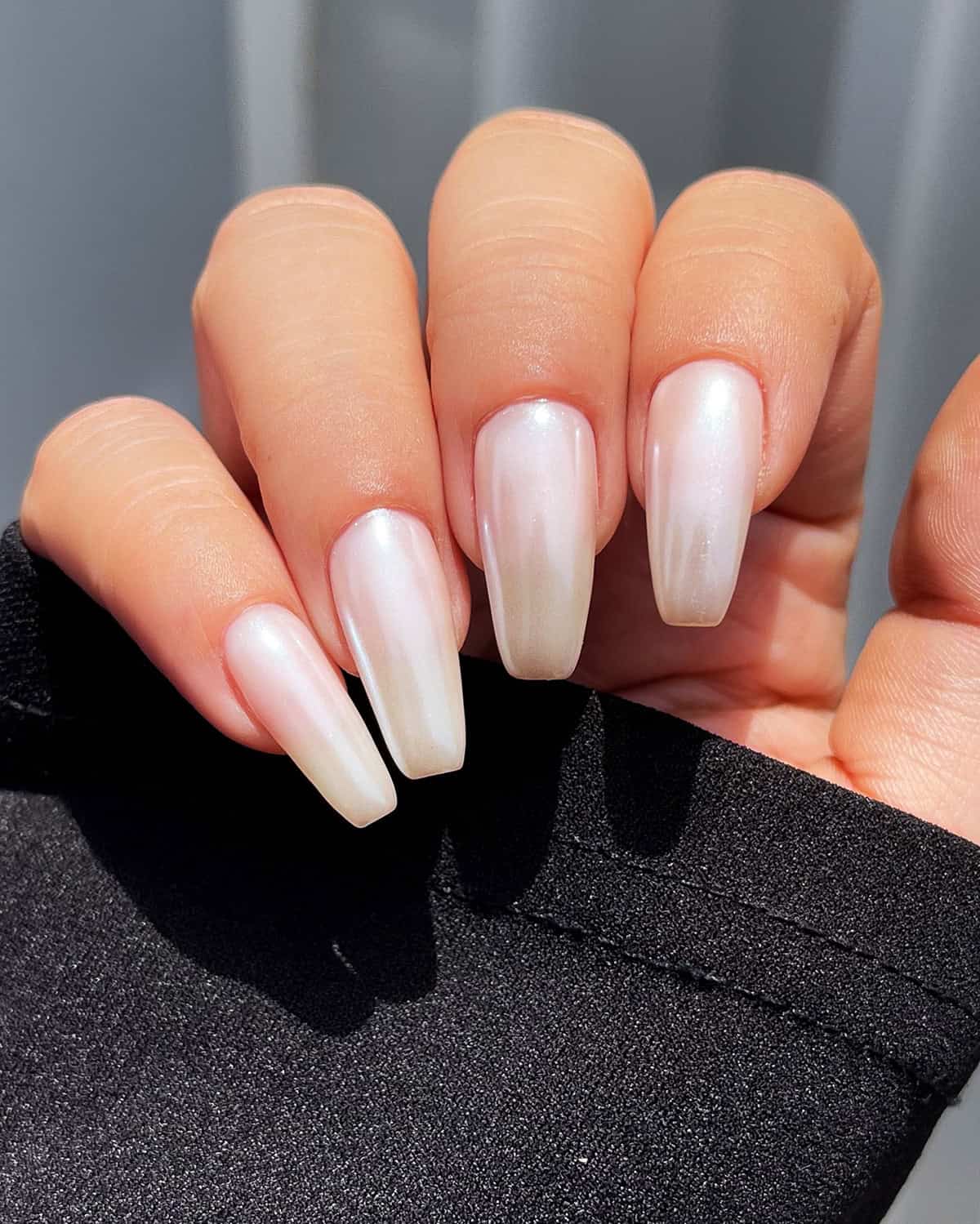 long coffin nails with soft milky white pearl chrome finish white chrome nails