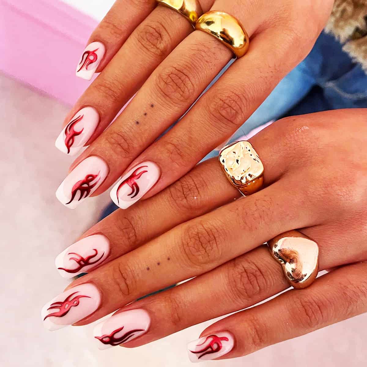 square nude nails with red chrome flame designs red chrome nails