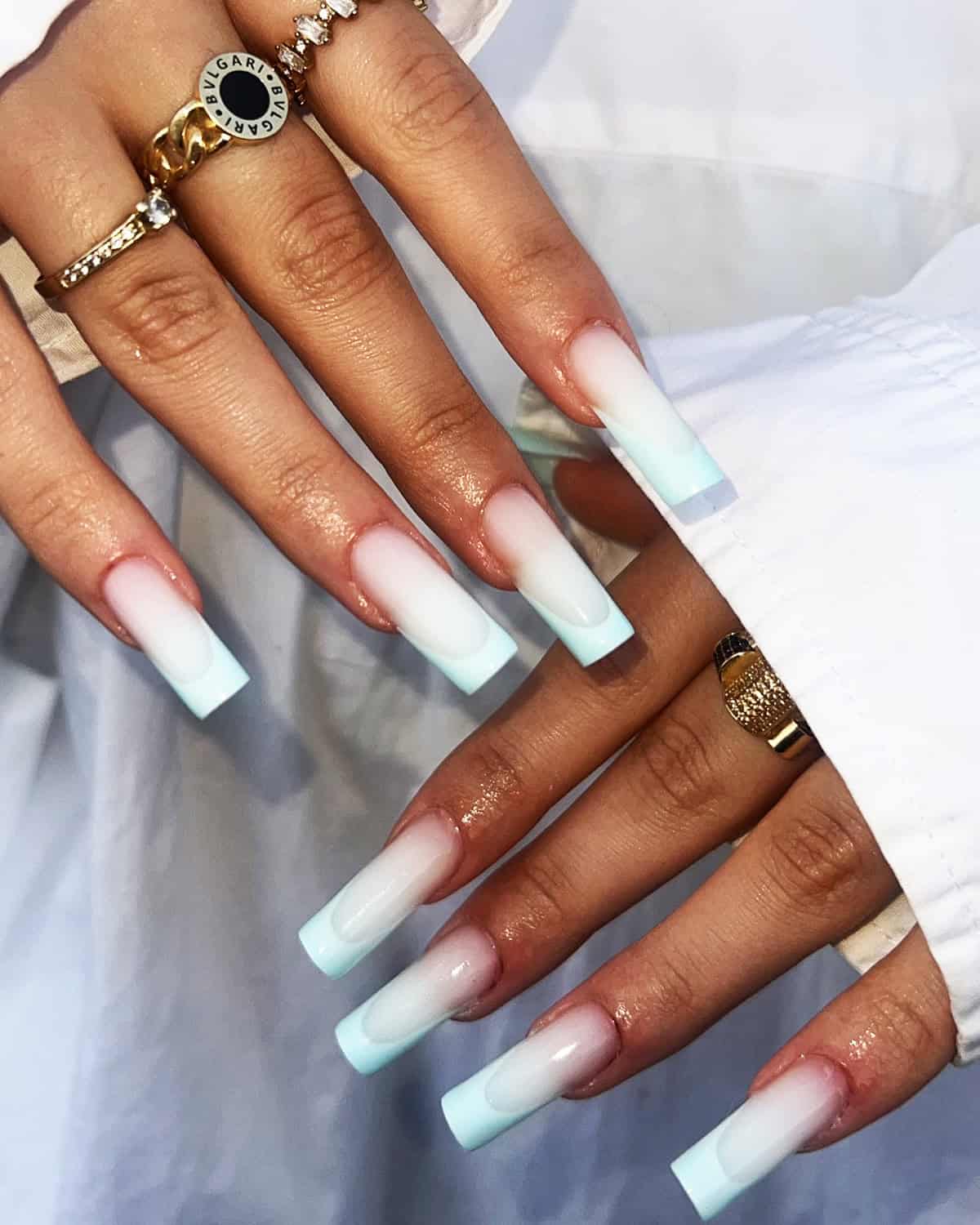 milky white to icy blue ombre square nails clean summer look baddie nails for summer