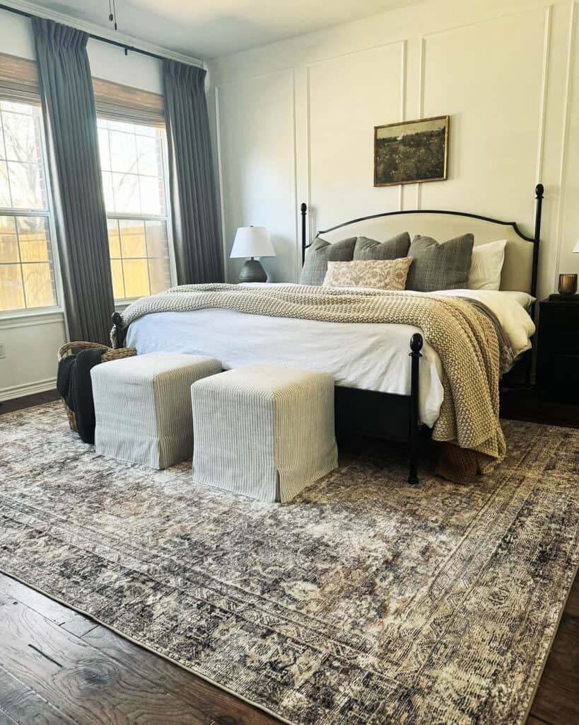metal bed frame with neutral bedding, chunky knit throw, bright window light cottagecore bedroom insp