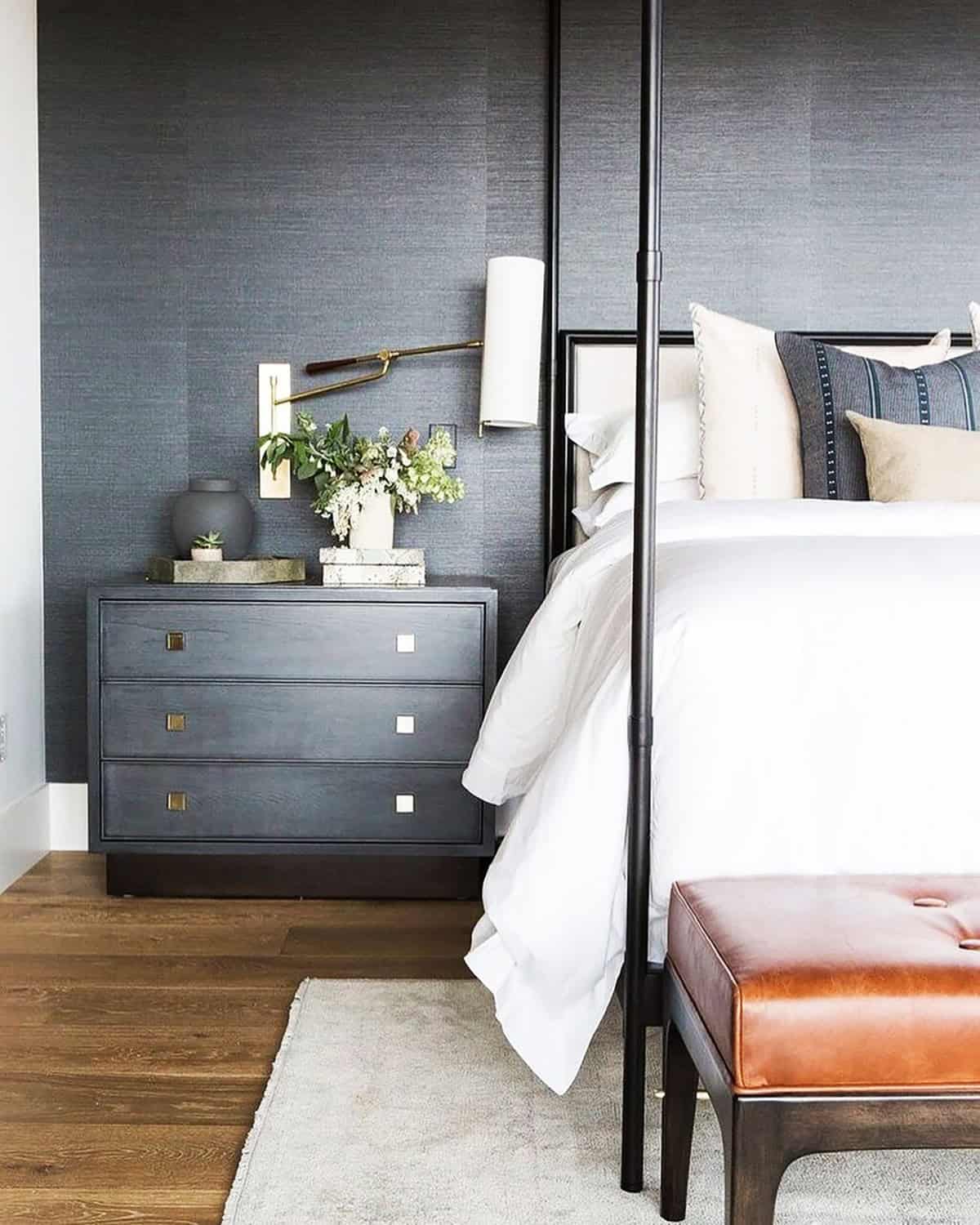 cozy bedroom with textured black wallpaper and soft neutral bedding black wallpaper ideas home decor