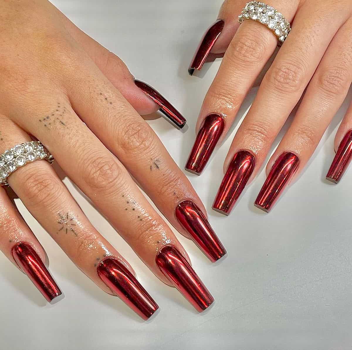 long coffin mirror red chrome nails ultra reflective metallic finish red chrome nails