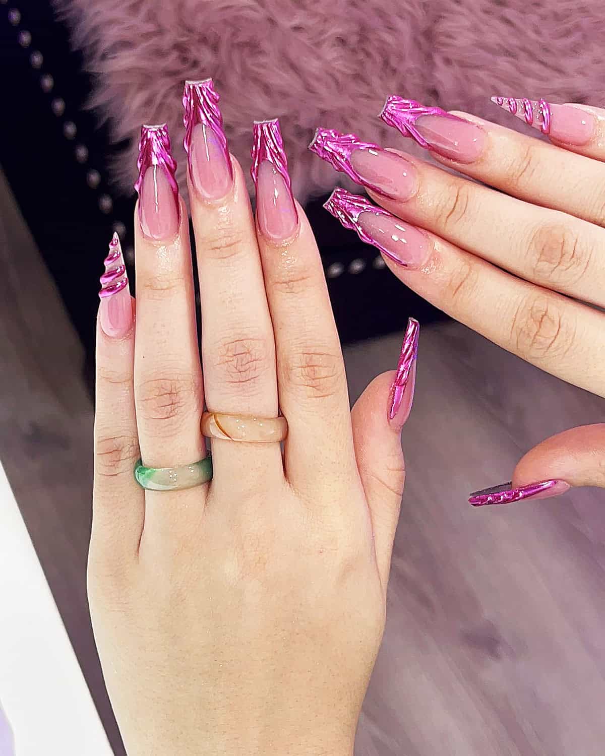 long coffin nails with pink chrome foil tips over sheer base high contrast glossy pink chrome nails