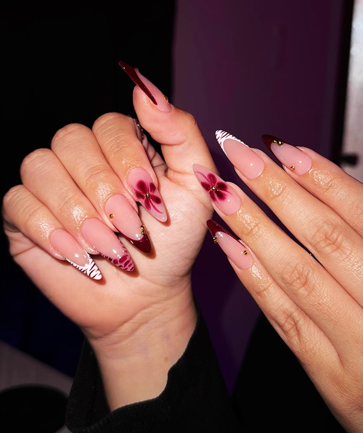 pink nails with rhinestone outlines and bow accents girly glam style baddie nails for summer