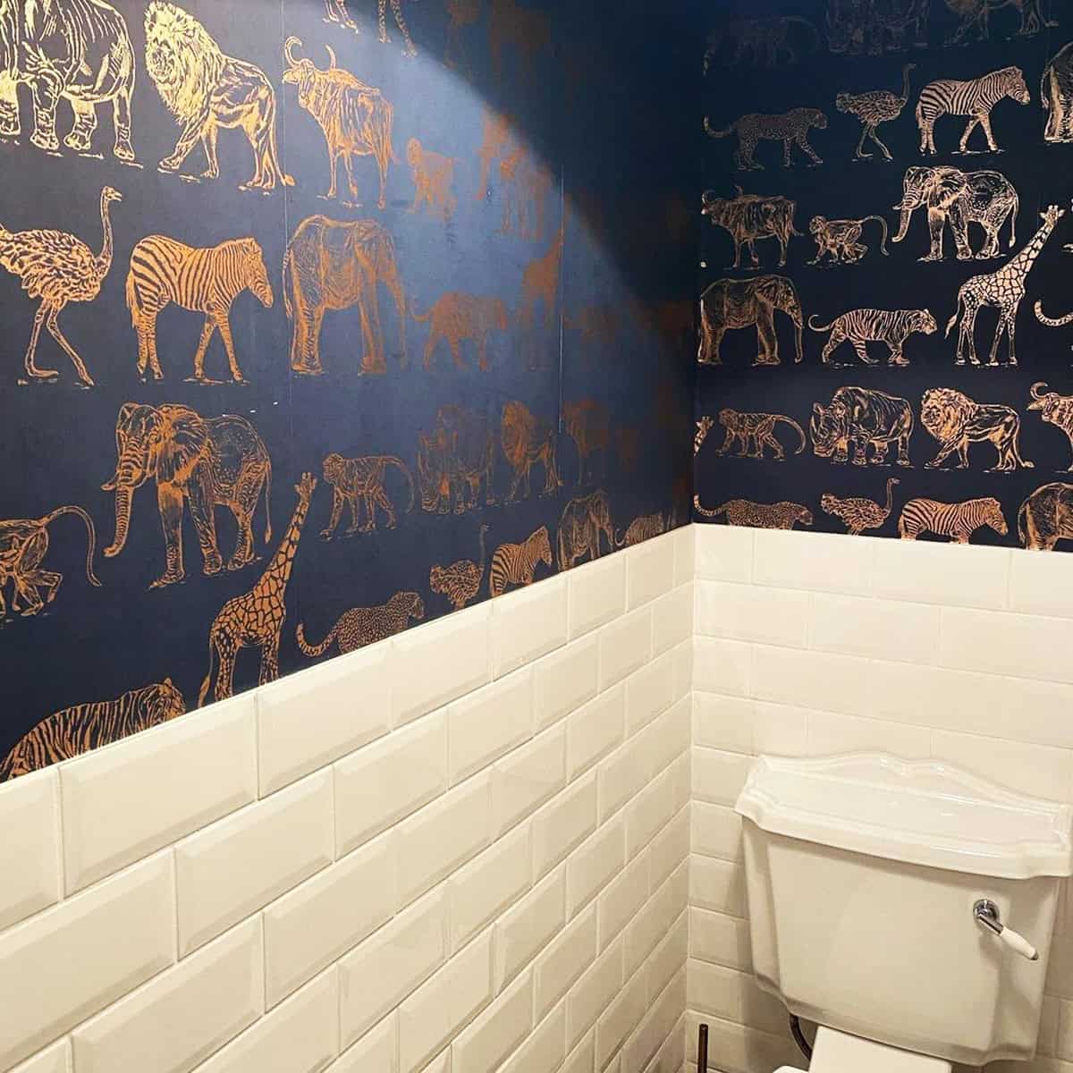 safari animal wallpaper in gold over dark blue bathroom walls dark blue wallpaper ideas home decor