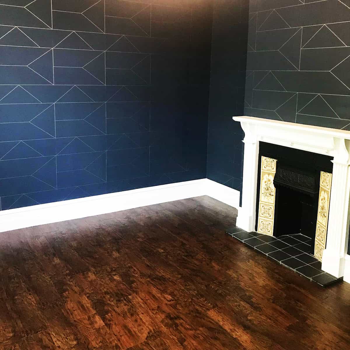  geometric line wallpaper in deep blue modern room dark blue wallpaper ideas home decor