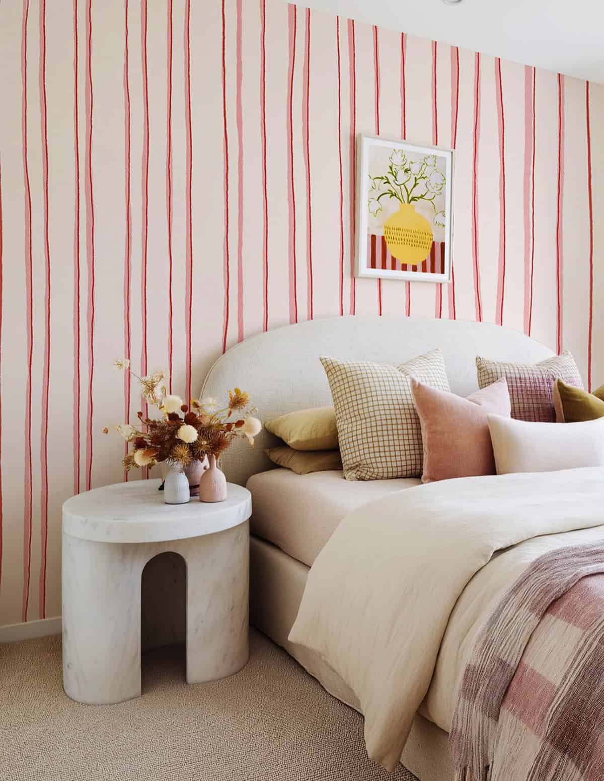 thin stripe wallpaper in blush and red in a modern bedroom pink wallpaper ideas home decor