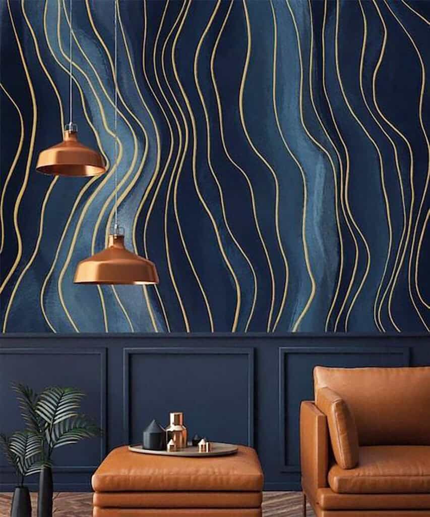 wavy gold line wallpaper on deep blue wall with leather chair dark blue wallpaper ideas home decor