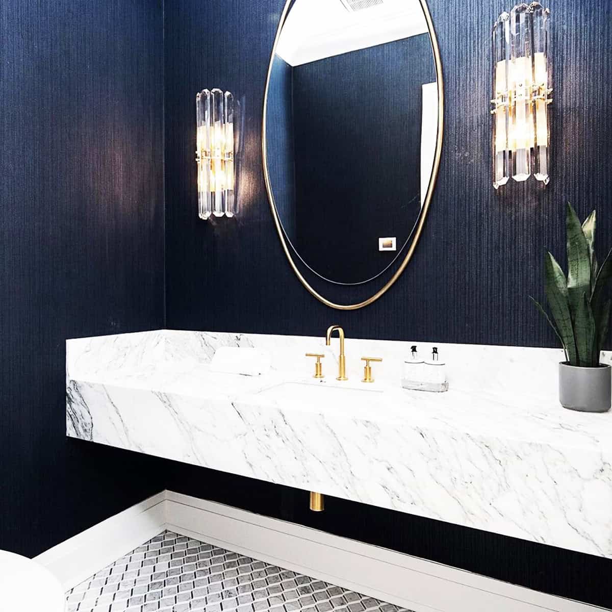 textured dark blue wallpaper in modern bathroom with marble sink dark blue wallpaper ideas home decor
