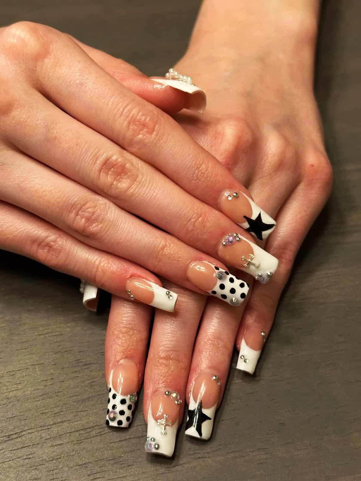 pink leopard and zebra print nails with cherry charms and rhinestones bold design baddie nails for summer