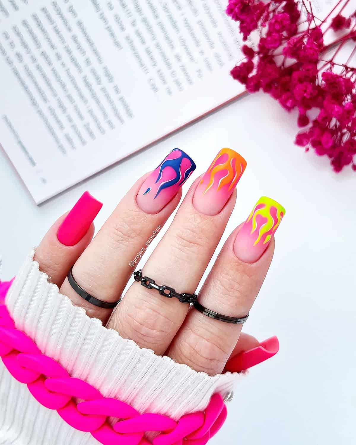 square coffin nails with nude ombre base and neon multicolor flame tips fire nails