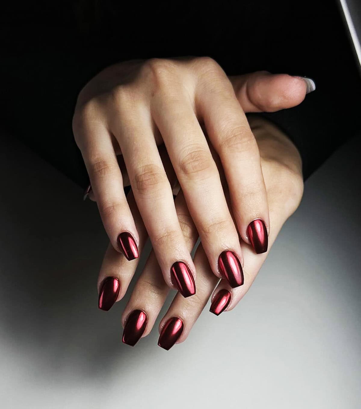 short oval red chrome nails glossy minimal polished look red chrome nails