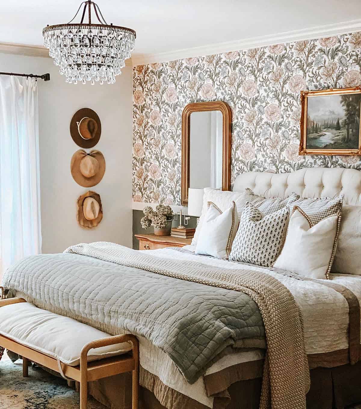 floral wallpaper with neutral bedding, wood bench, soft layered textures cottagecore bedroom insp