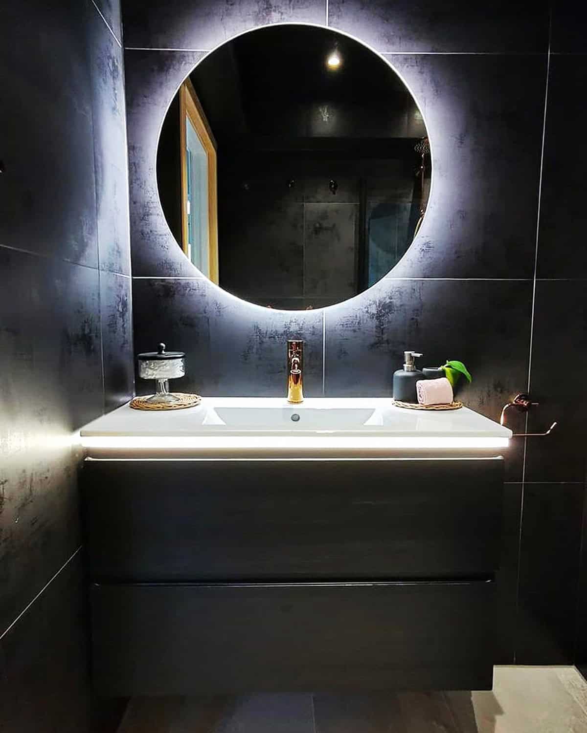 black bathroom with backlit mirror and floating vanity black bathroom ideas