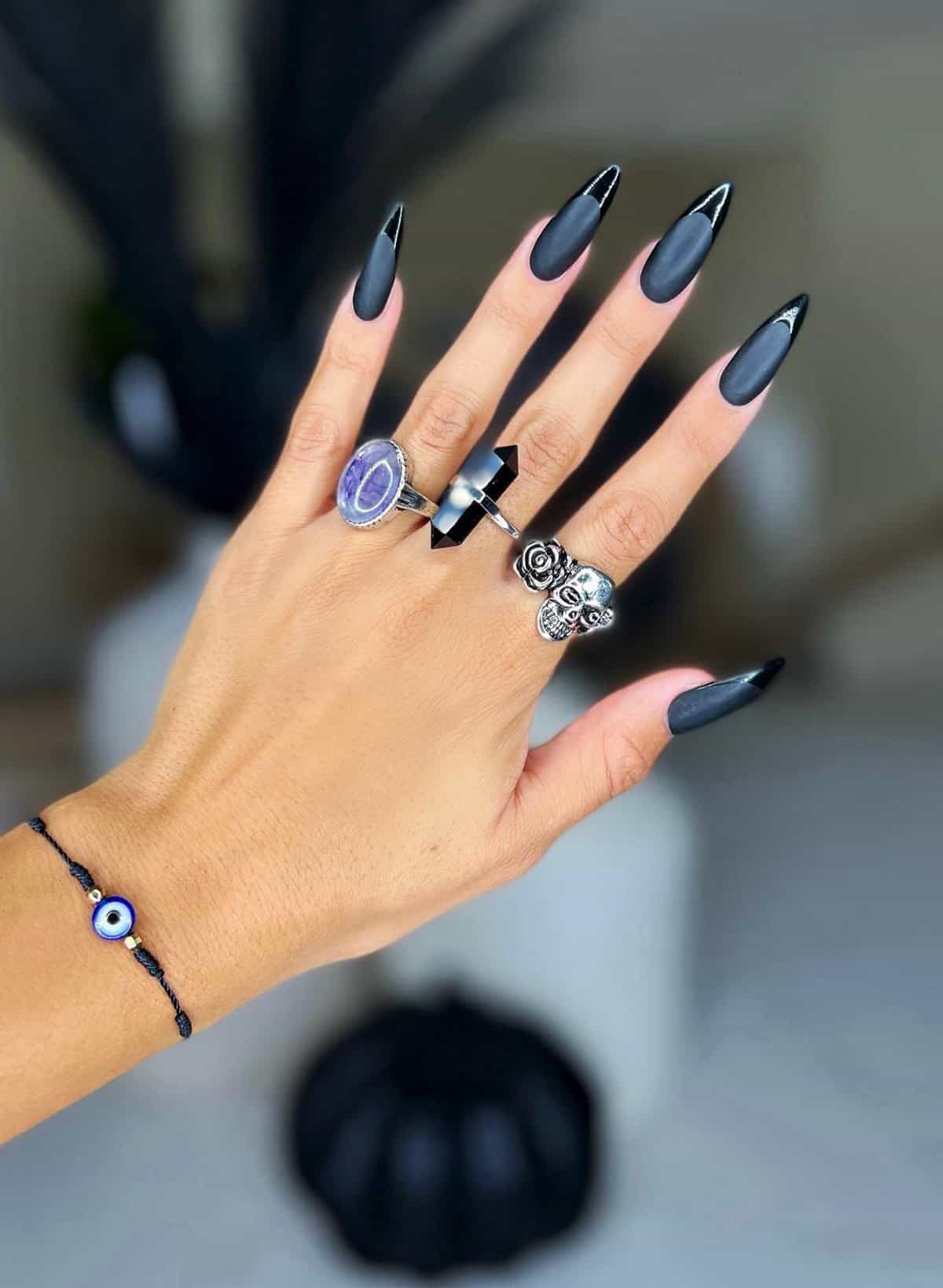 matte grey almond nails with glossy black tips in modern French style, minimal black baddie nails