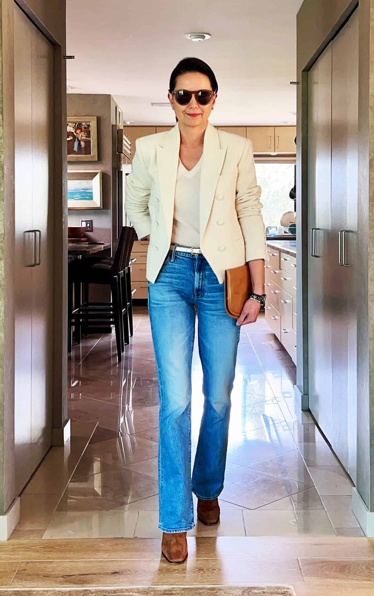 cream double-breasted blazer with white tee, wide-leg jeans and tan ankle boots for office attire for women over 40
