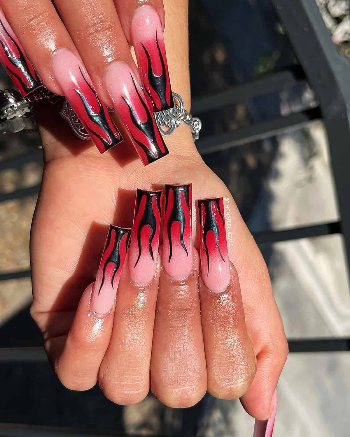 long square red and black ombre nails with dramatic tall flame nail art fire nails