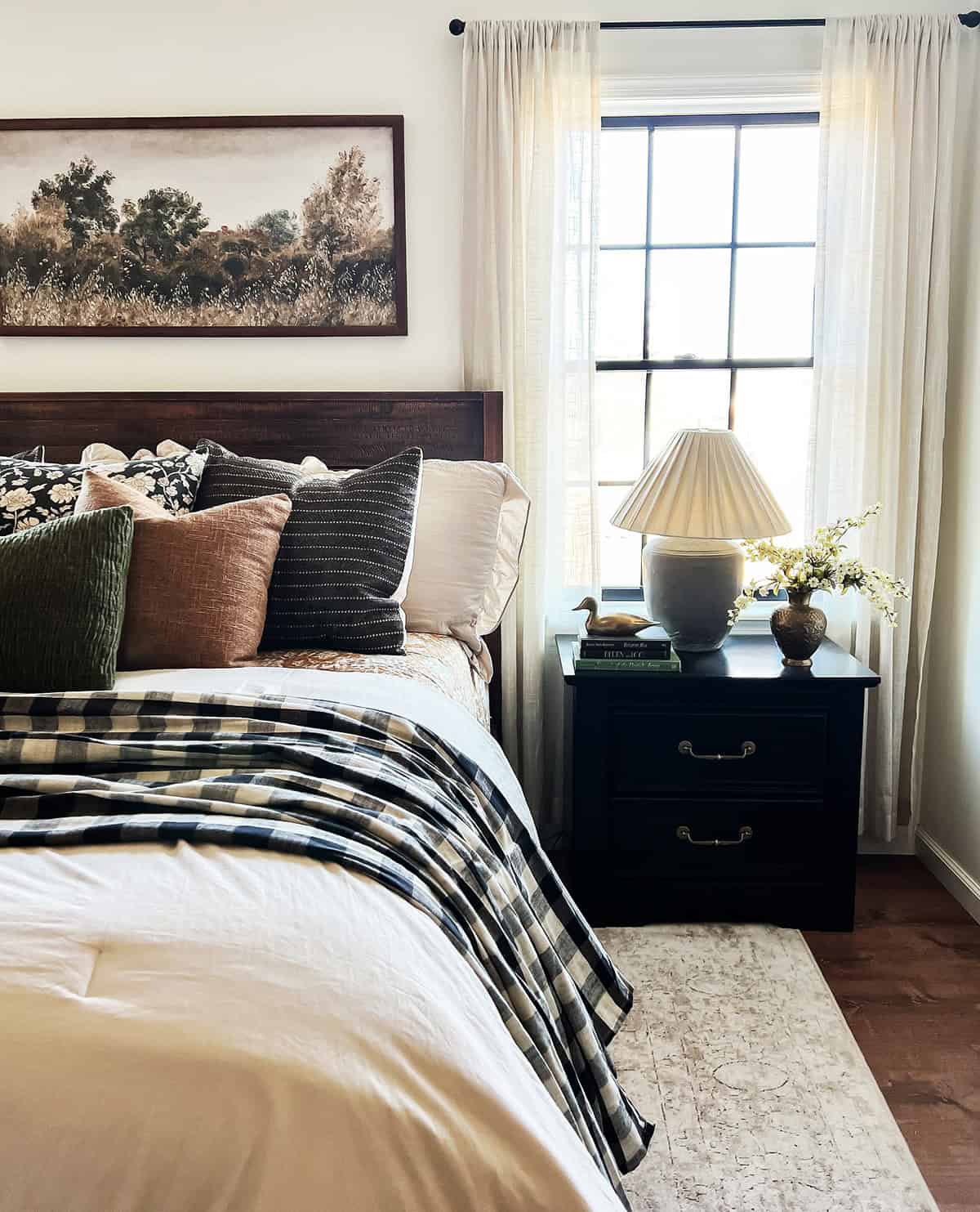 layered bedding with plaid throw, darker tones, soft light window bedroom cottagecore bedroom insp