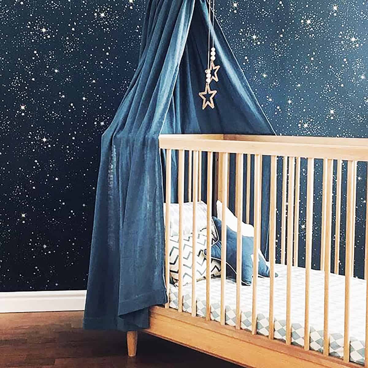  starry night wallpaper in dark blue nursery with crib dark blue wallpaper ideas home decor