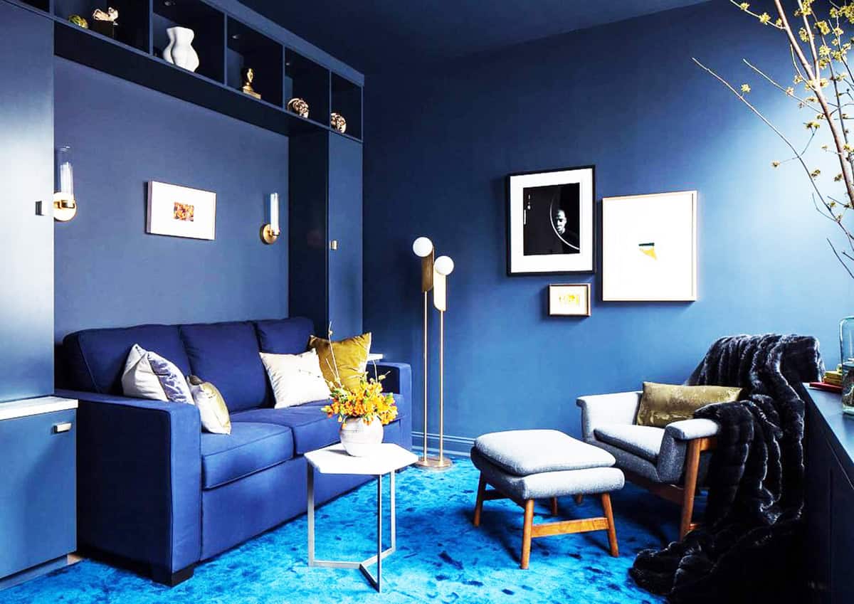 solid dark blue walls with minimal texture in modern living space dark blue wallpaper ideas home decor