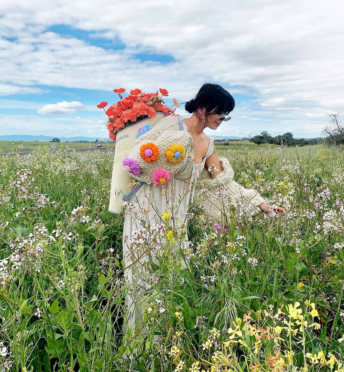 soft layered cottagecore outfit in a wildflower field with relaxed styling cottagecore summer dresses